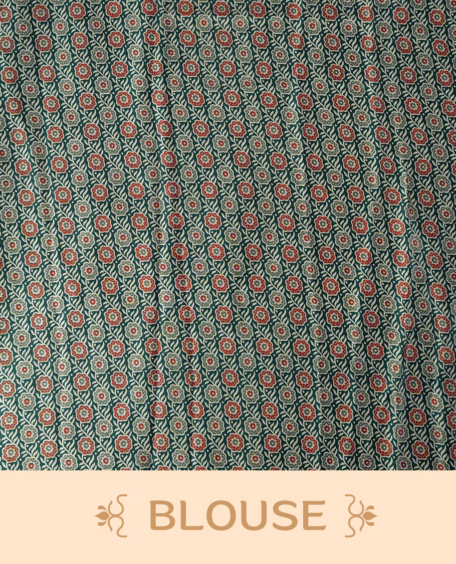 Teal and cream colour saree with bold stripes and geometric circle motifs, accentuated by a detailed ethnic border & paired with matching blouse.