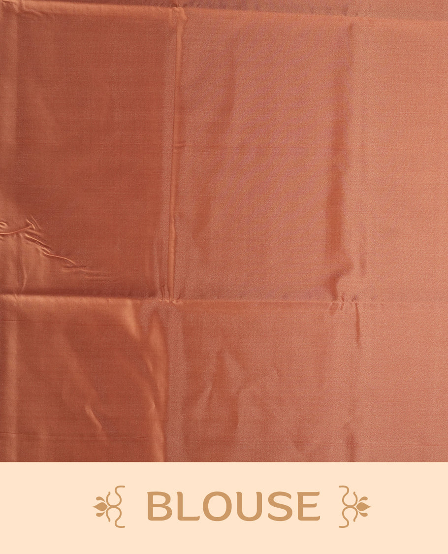 Amber rose colour semi soft silk saree, adorned with subtle self woven motifs on the body & The design is elevated with an elegant zari border & pallu with intricate detailing and tassel accents, paired with a matching blouse.