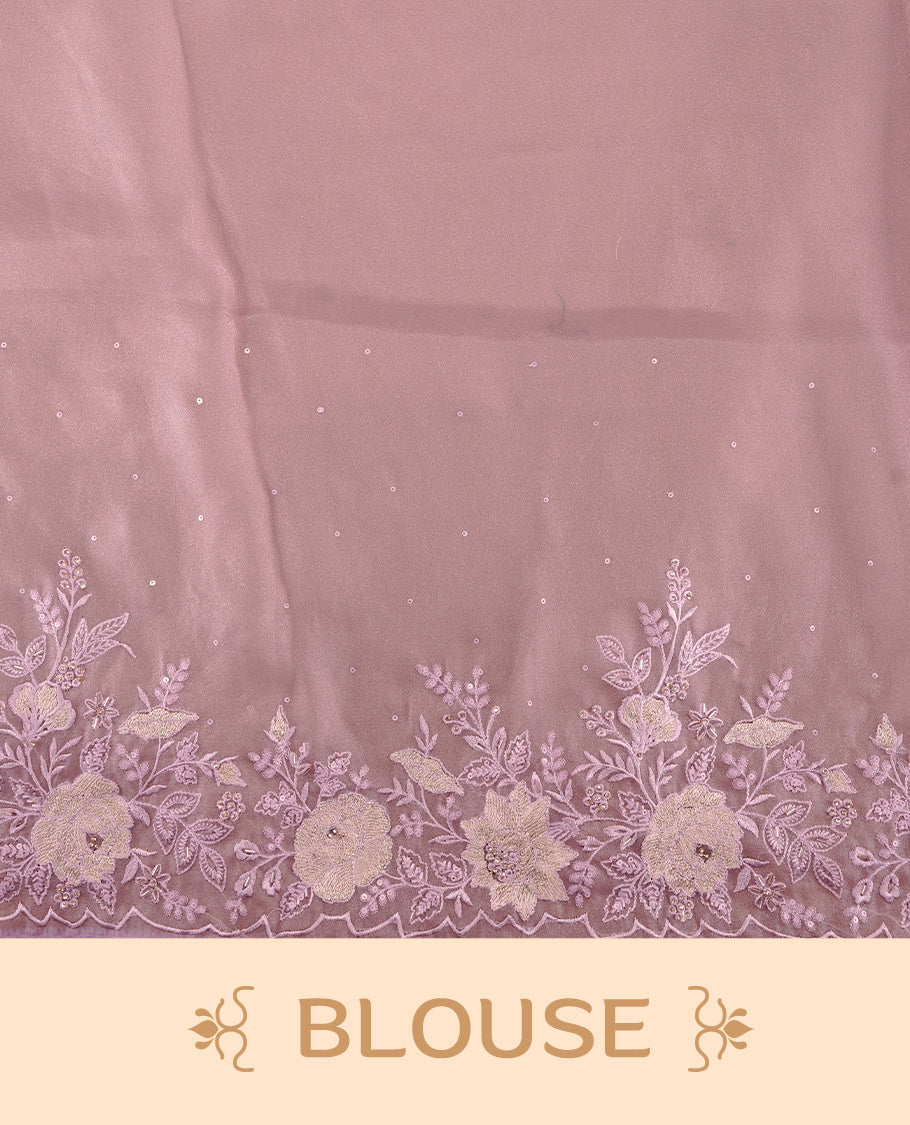Pastel purple colour organza saree featuring thread with cut beats & sequins floral pattern on body, highlighting scalp border, paired with matching blouse piece.