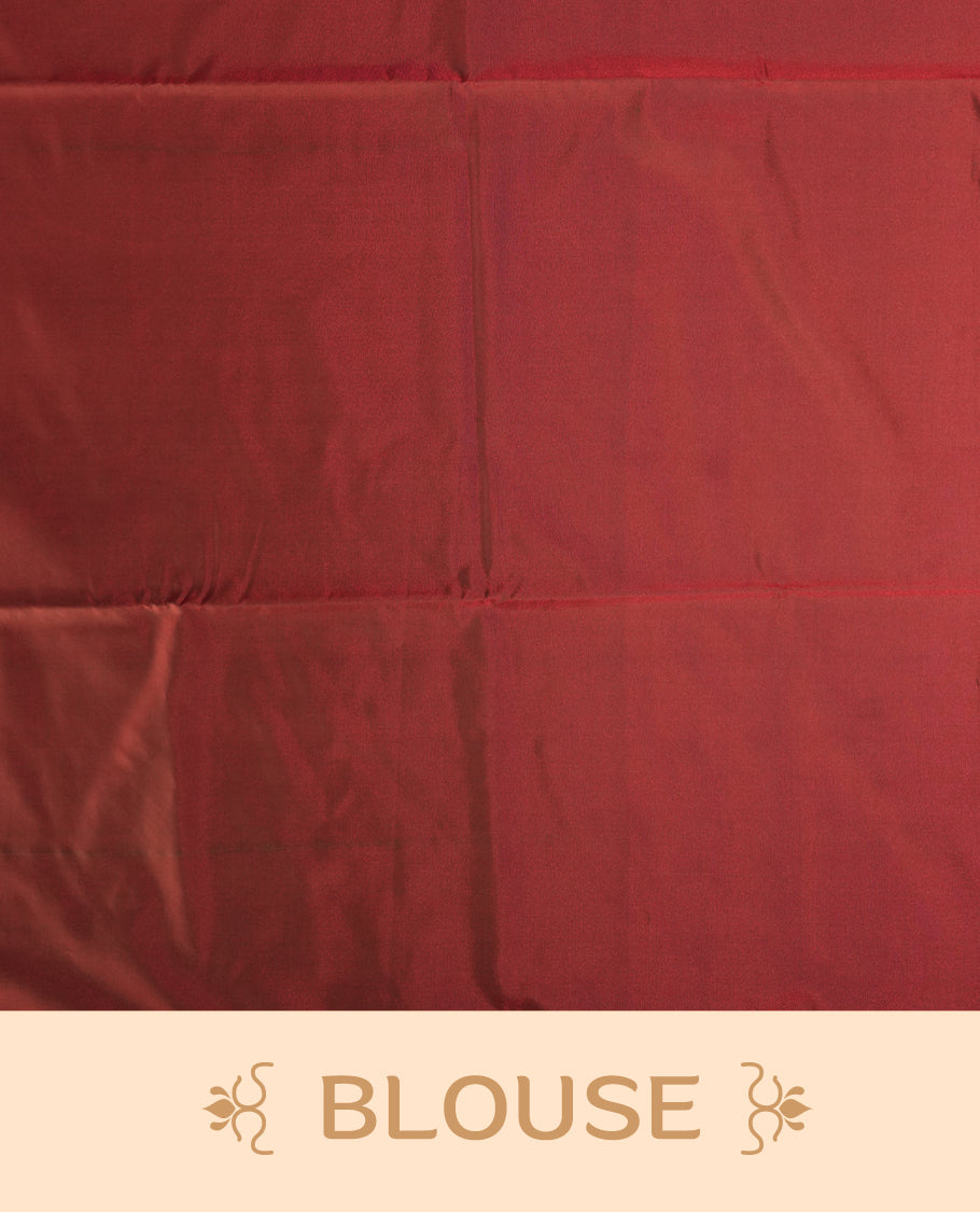 Dual tone medium copper & green semi soft silk saree adorned with woven square motifs on the body, complemented by a rich contrast woven pallu with tassel detailing & Comes with a matching blouse piece.