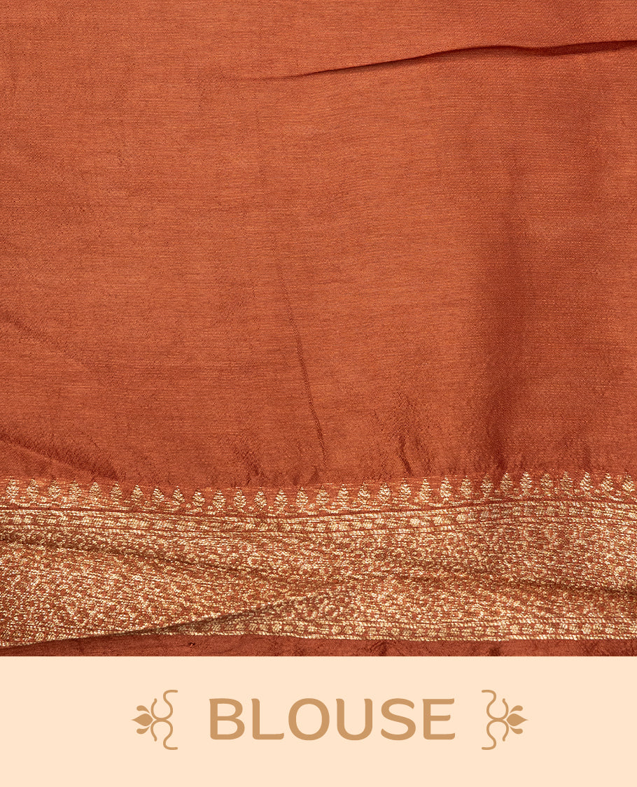 Brown colour Semi Banaras Tussar Georgette Featuring Gold zari Leaf pattern on body, Finished with Gold zari border and paired with matching blouse piece.
