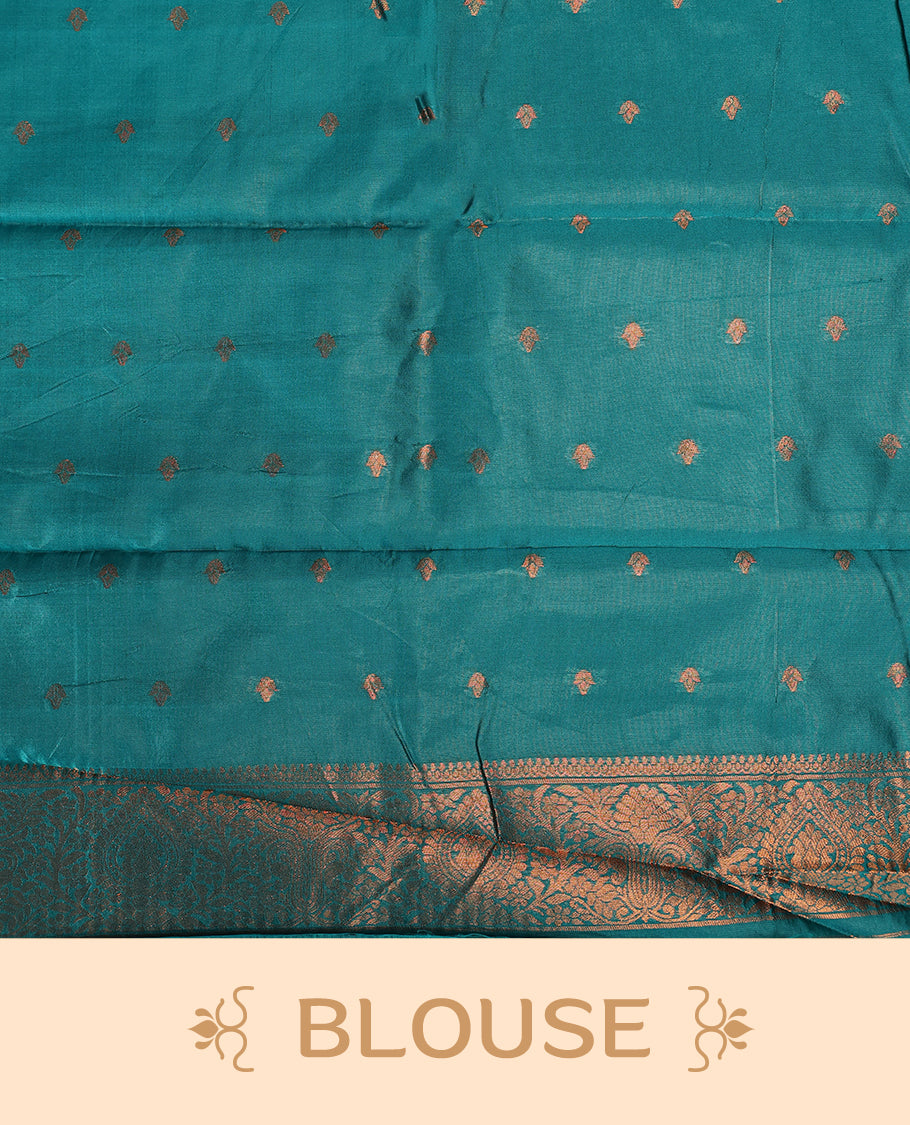 Navy blue colour saree adorned with bold turquoise zigzag woven patterns along the border and pallu, finished with a rich metallic woven design, paired with a matching blouse