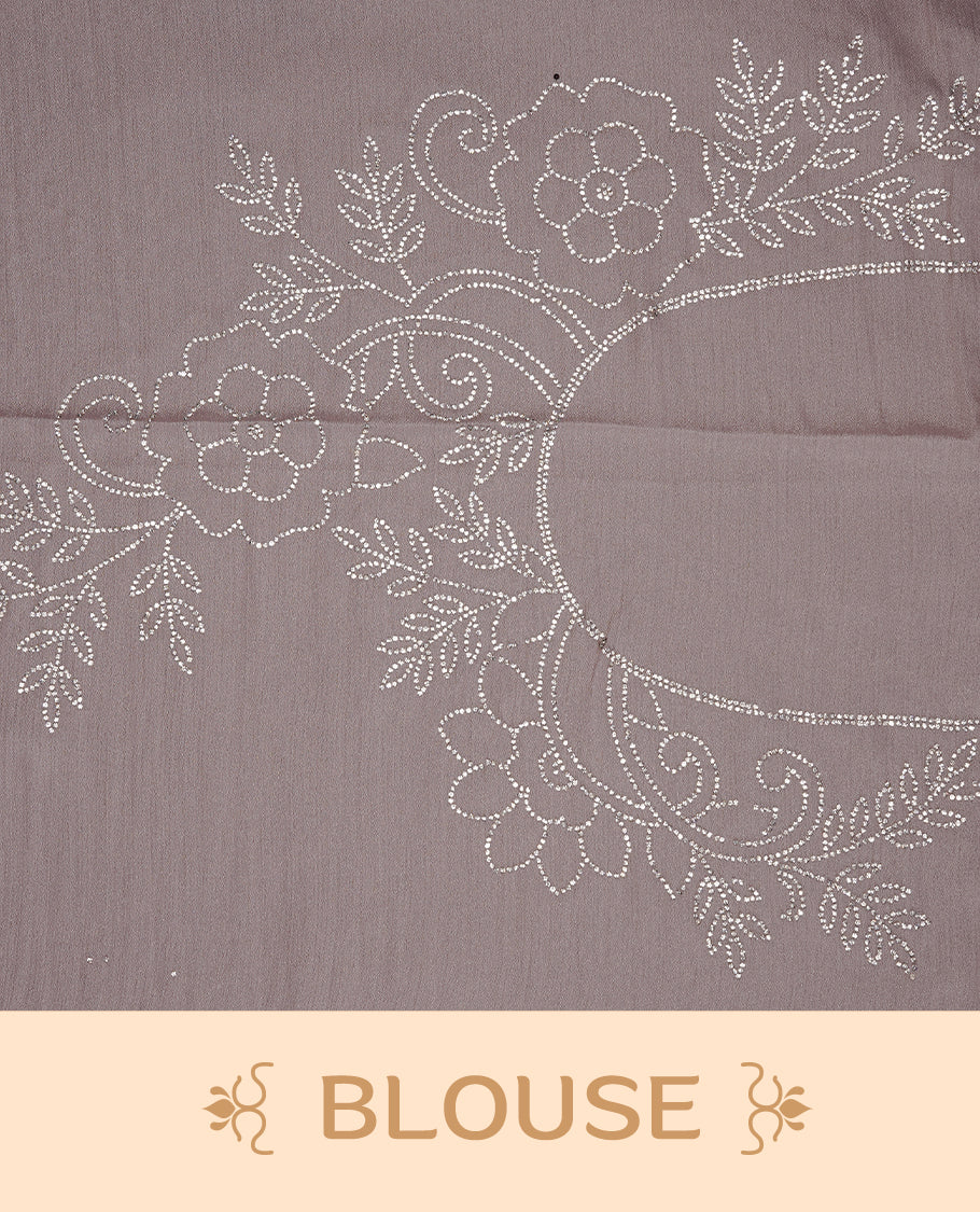Light pink colour designer saree featuring white stone stripes on body, highlighting white stone with scalp border, paired with matching blouse piece.