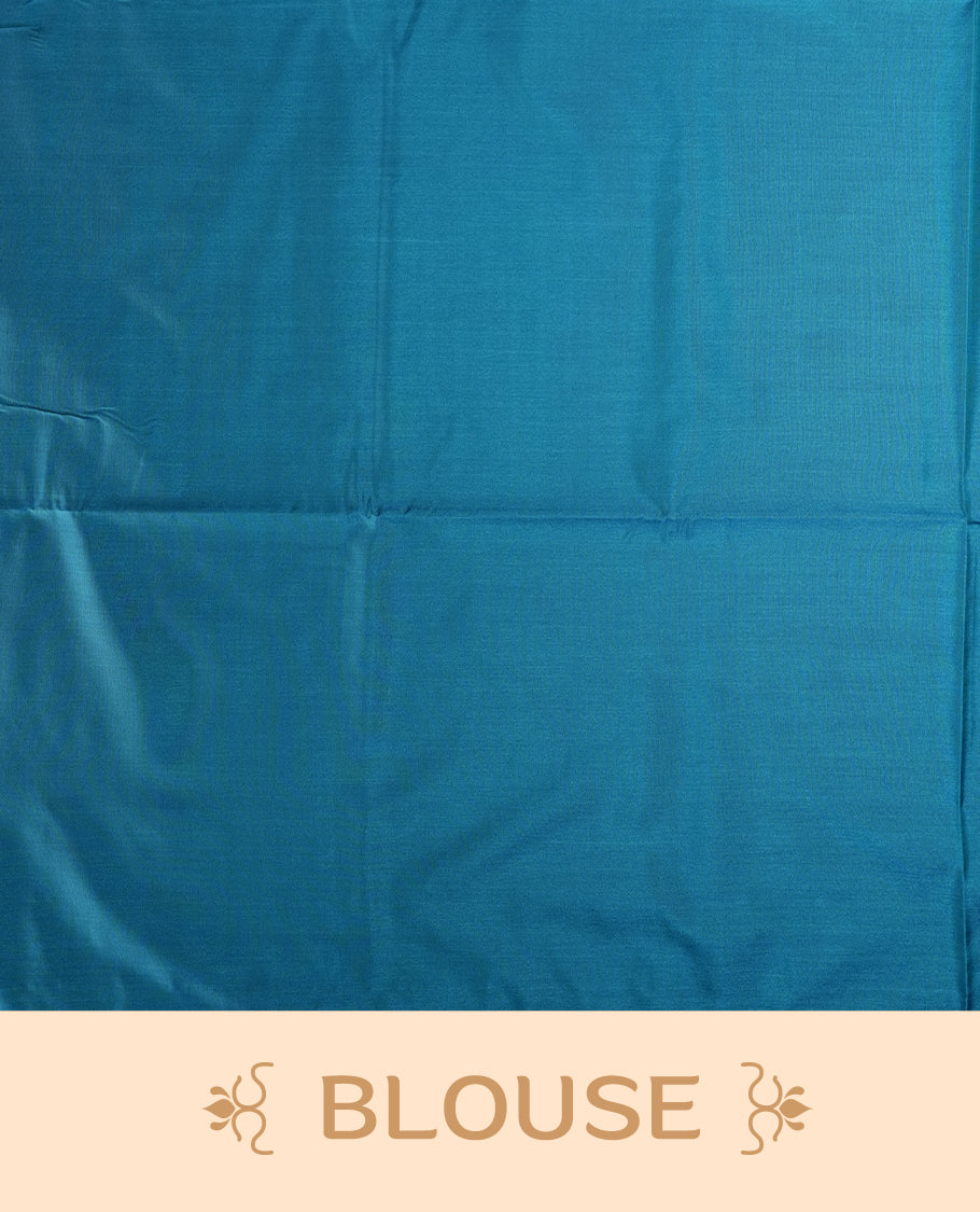 Rich Blue colour semi soft silk saree, adorned with subtle self woven motifs on the body & The design is elevated with an elegant zari border and pallu with tassels, paired with a matching blouse.