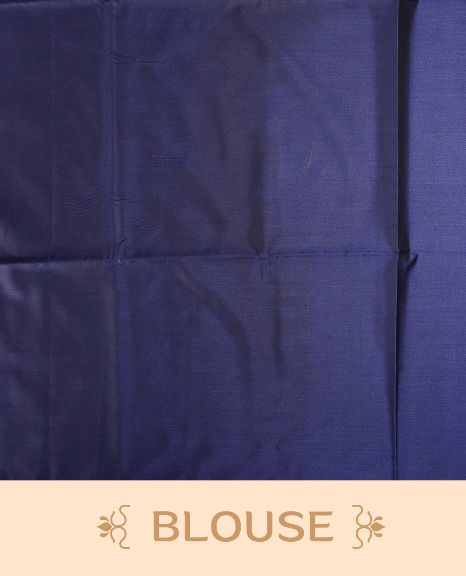 Royal purple colour semi soft silk saree adorned with delicate woven floral motifs on the body, complemented by a rich contrast deep blue colour woven pallu with intricate detailing and tassel accents & Comes with a matching blouse piece.