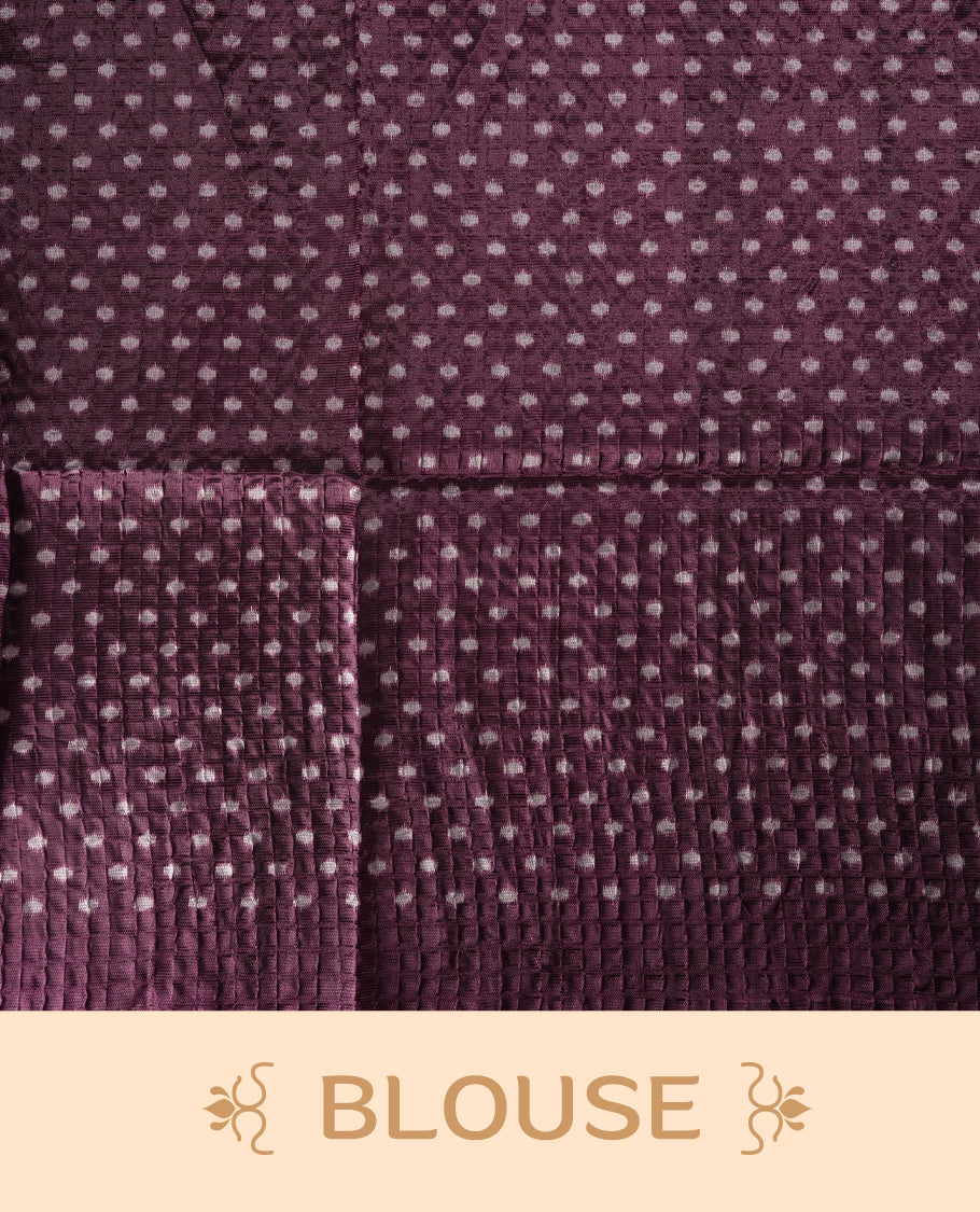 Classic off white colour saree adorned with intricate grape colour tribal motifs and rich woven patterns on the pallu and border & Paired with matching blouse.