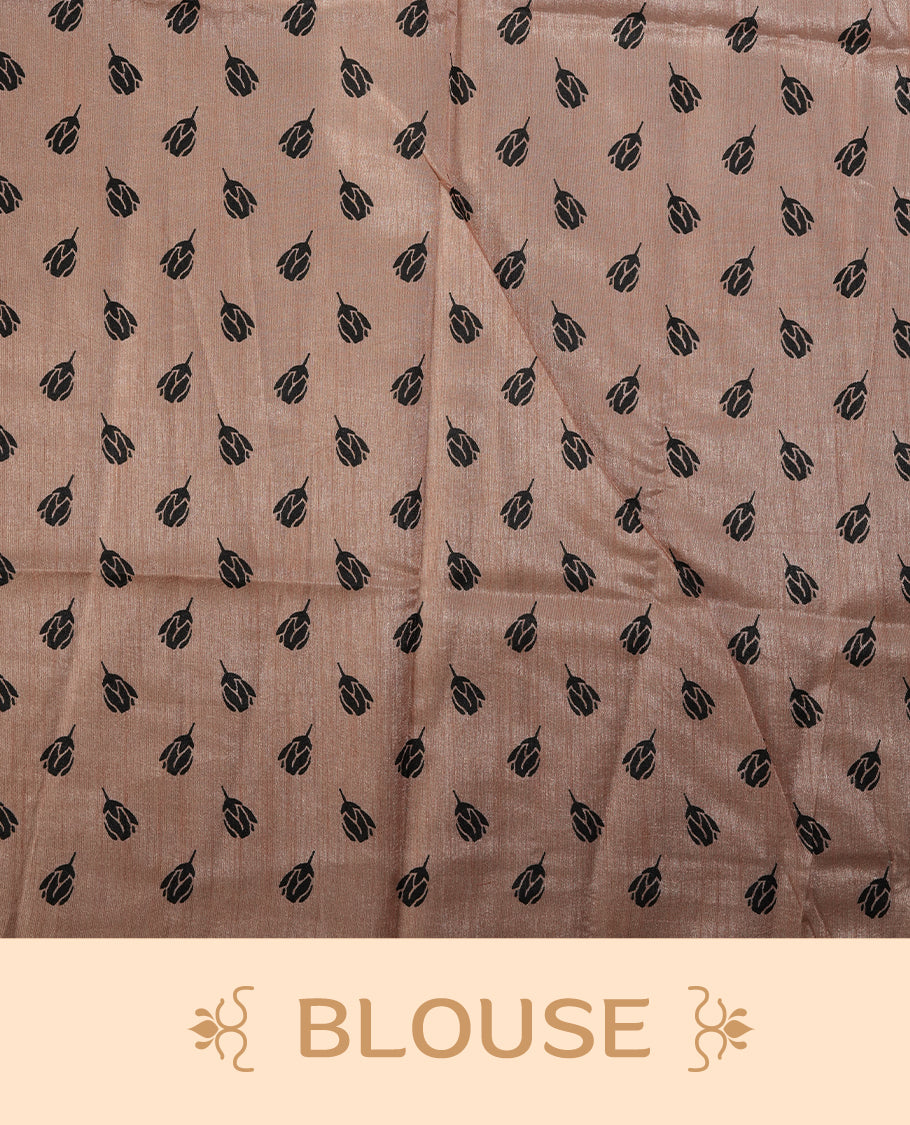 Pastel peach colour saree with delicate black floral prints spread across the body, The black pallu features coordinated floral motifs and stripes, Finished with a sleek border and paired with a matching blouse.