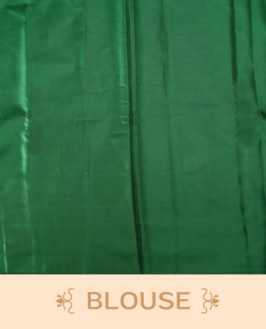 Green colour semi silk saree featuring golden zari floral motifs all over the body, complemented by a rich self colour woven border, with matching blouse.