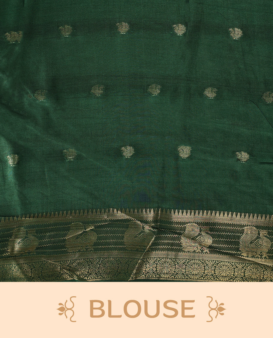 Off white colour saree with delicate golden motifs, highlighted by a striking pink upper border, rich green zari woven border, and a contrasting red and green pallu with intricate floral and geometric designs, paired with a matching blouse