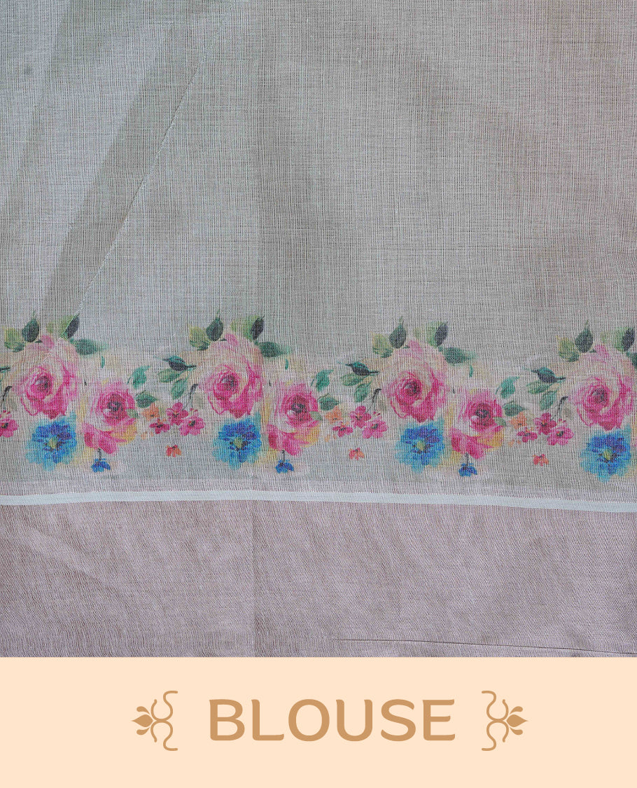 Cream Colour Tissue Kerala Saree Featuring Digital Floral Prints Across The Body, Enhanced With A Rose Gold Zari Border, Finished With Pink & Green Tassels And A Matching Blouse Piece