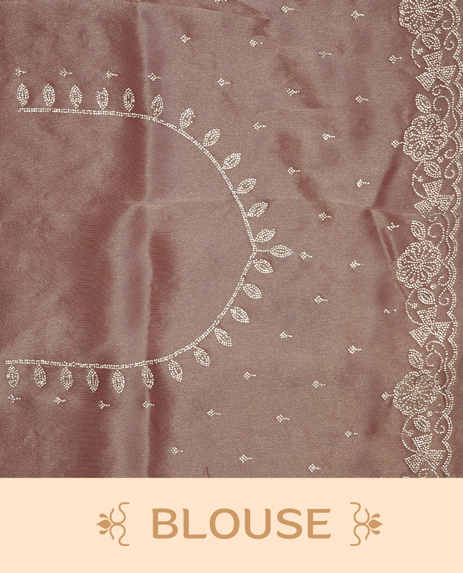 Pinkish purple colour designer saree featuring stone worked body, stone worked border, paired with matching blouse piece.
