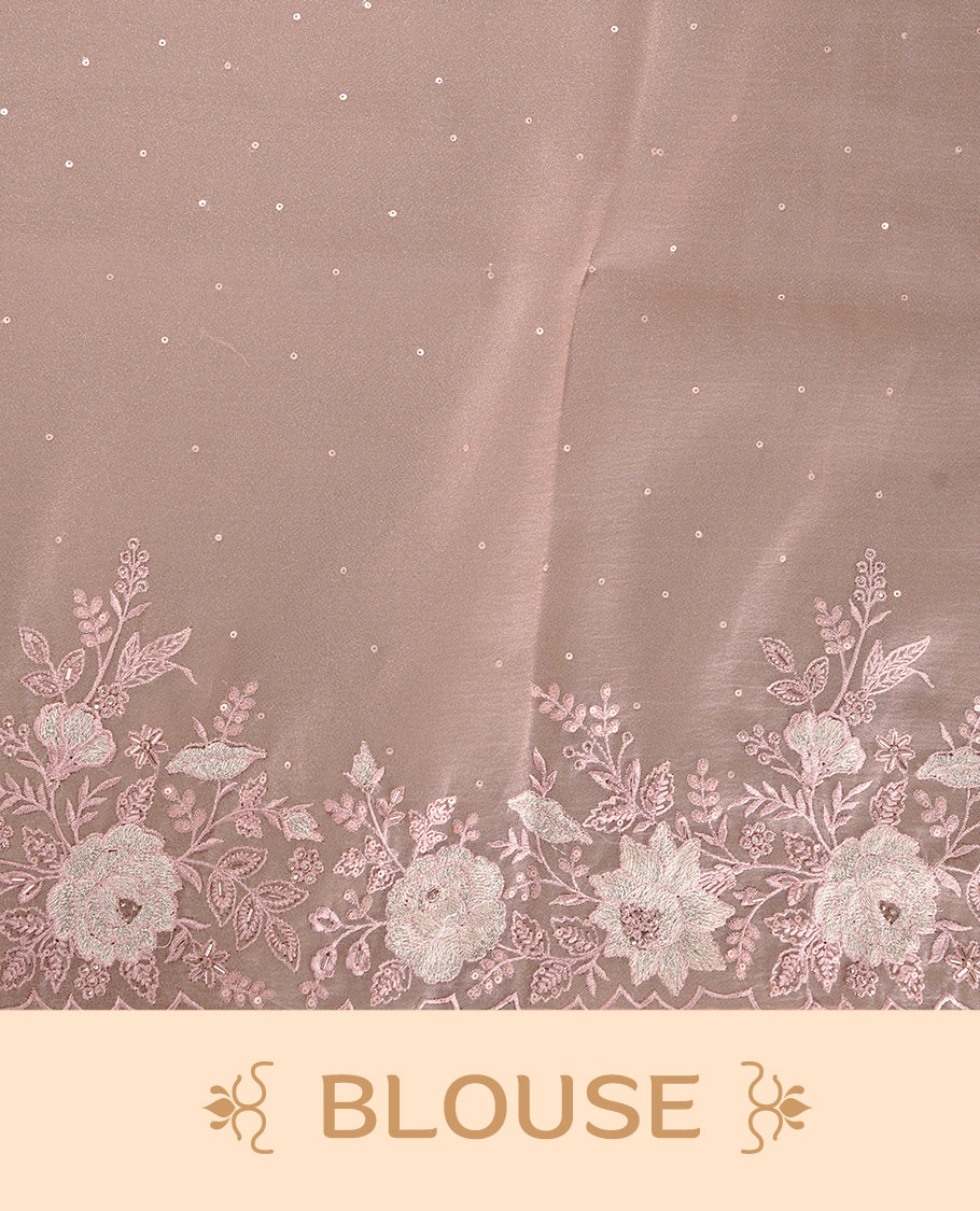 Pastel pink colour organza saree featuring thread with cut beats & sequins floral pattern on body, highlighting scalp border, paired with matching blouse piece.