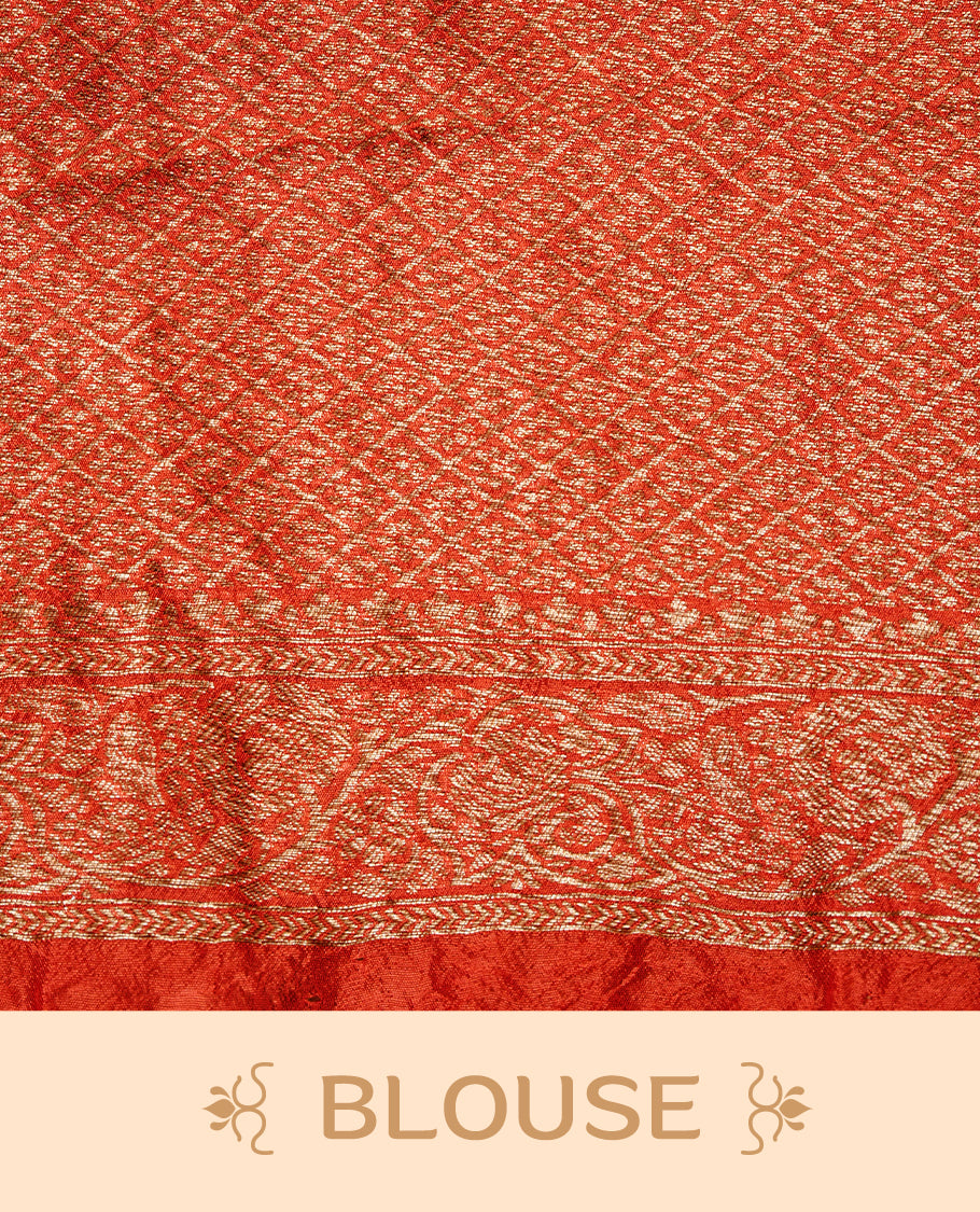 Red colour Banarasi Bandhani silk saree featuring intricate antique zari circle Buttas across the body, complemented by an elegant antique zari border. Comes paired with a matching blouse piece