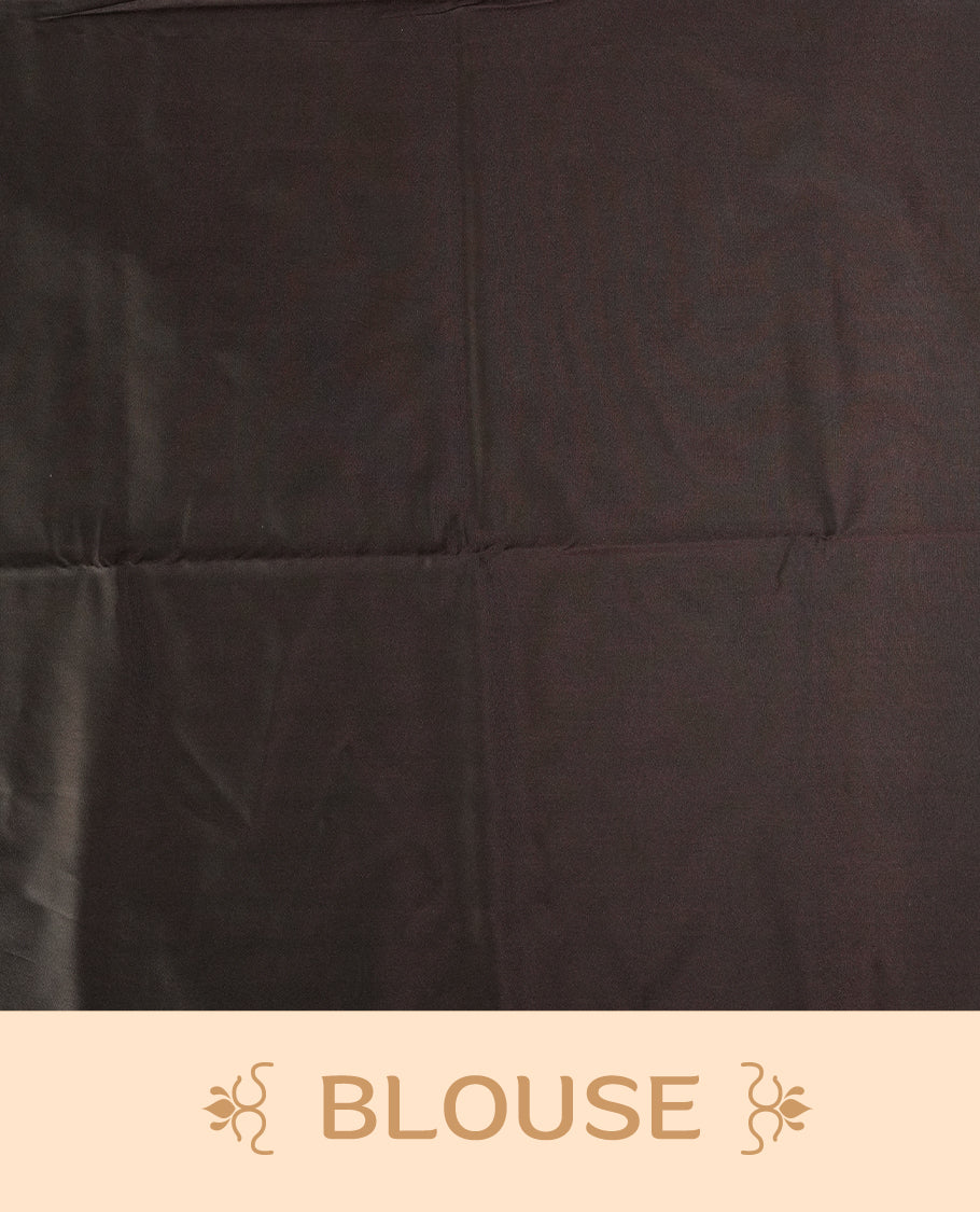 Dark mustard colour semi soft silk saree, adorned with subtle self woven motifs on the body & The design is elevated with an elegant zari border and dark chocolate colour pallu, paired with a matching blouse.