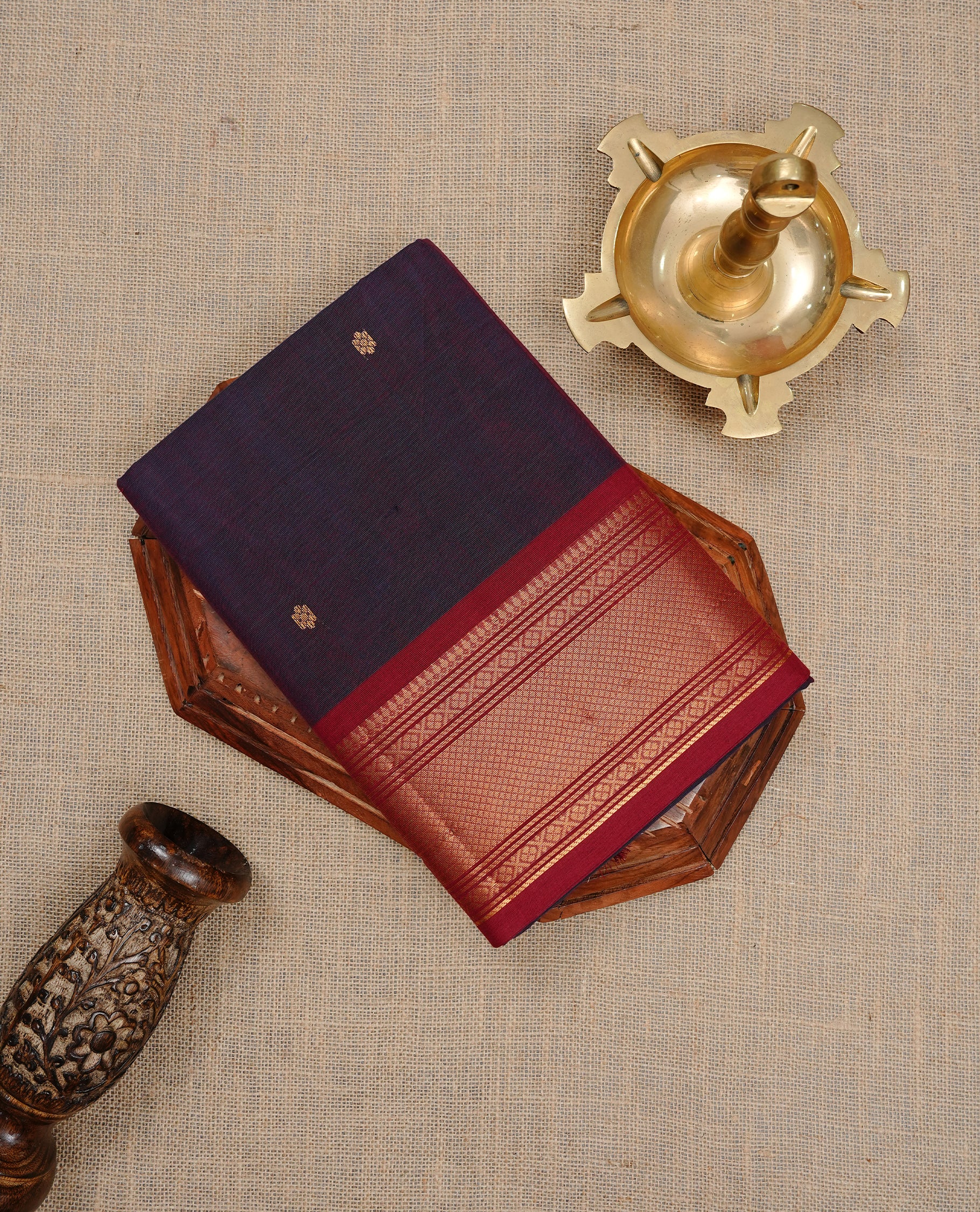 Teal & maroon colour Chettinad cotton saree featuring gold zari motifs body, complemented by contrast Maroon colour with gold zari border, paired with matching blouse piece.