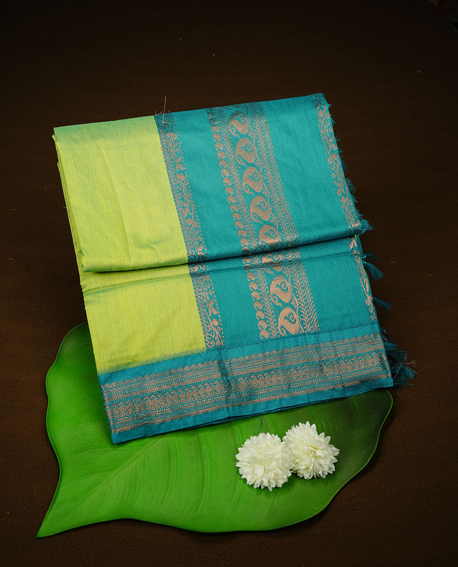 Lemon colour kalyani cotton saree featuring Elegant plain body, complemented by Aqua colour with Antique zari border, paired with matching blouse piece.