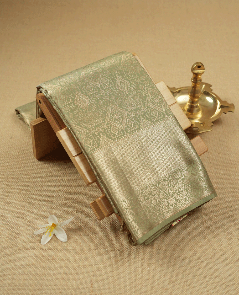 Pastel Sage Green Colour Kancheepuram Wedding Silk Saree having Zari Worked Body and Border with Self Coloured Blouse