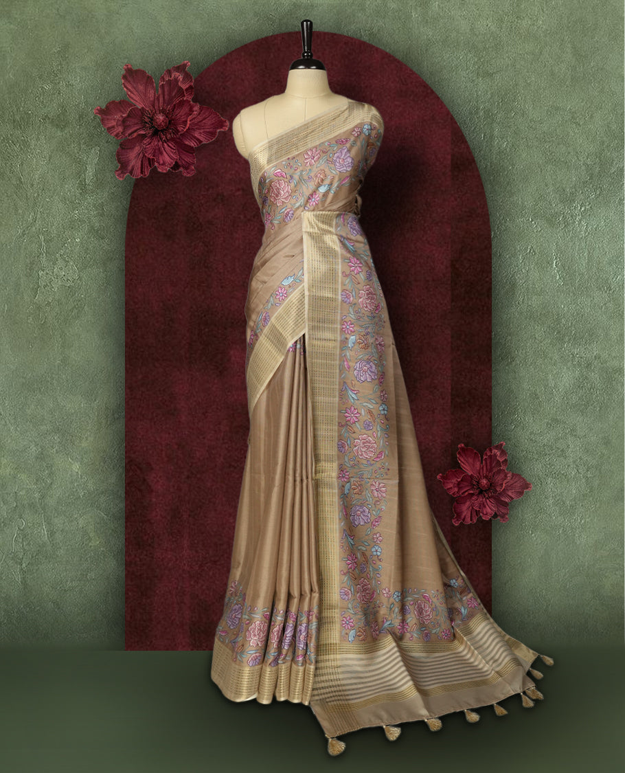 Beige colour Semi Tussar Silk saree with vibrant digital floral printed body and elegant Kandha work border & Paired with a matching blouse.