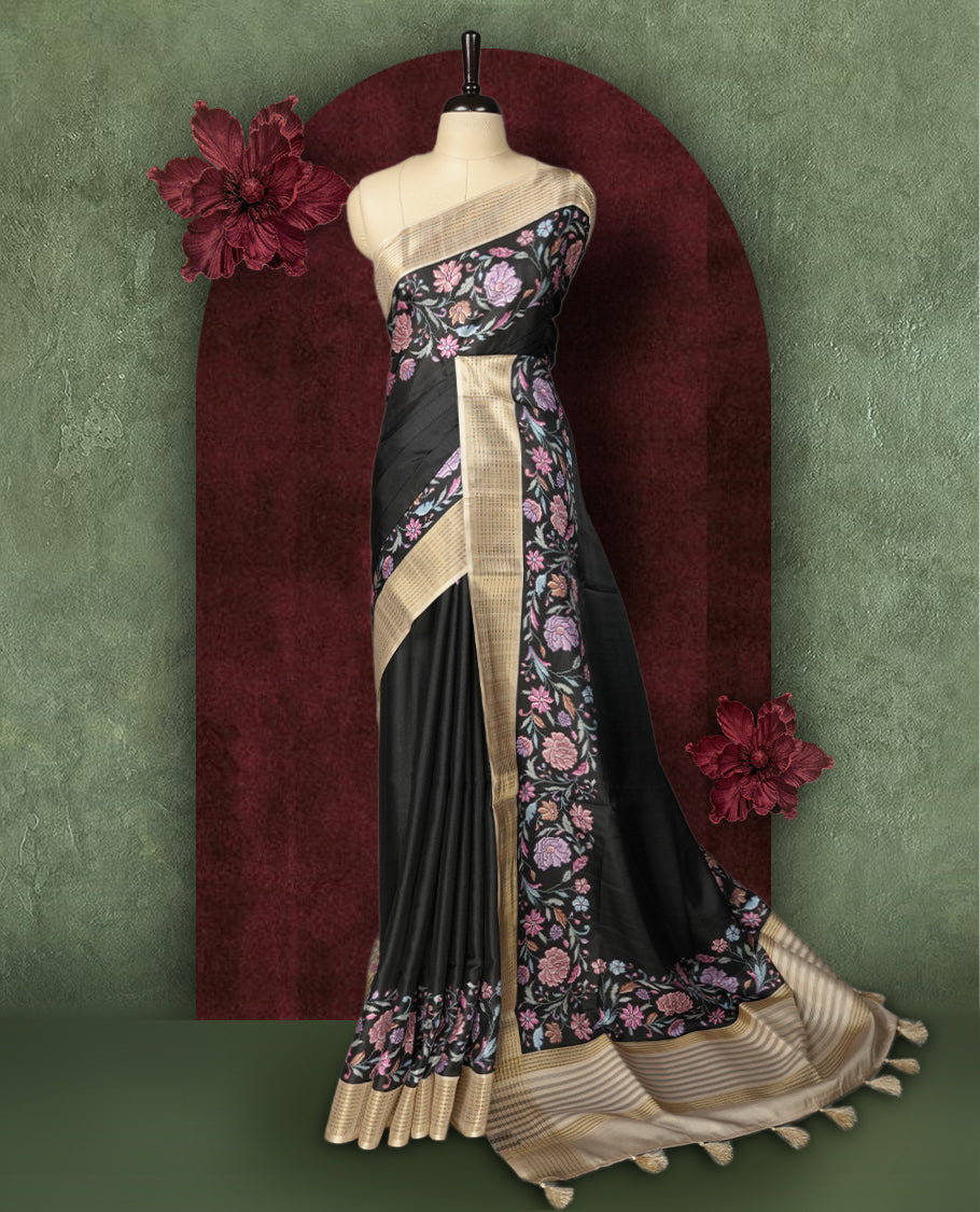 Black colour Semi Tussar Silk saree with vibrant digital floral printed body and elegant Kandha work border & Paired with a matching blouse.