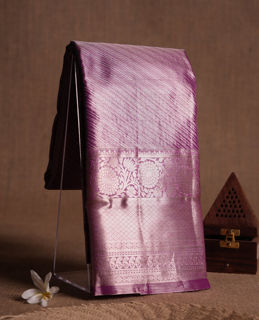 Neon Purple colour and rose gold Zari Tissue Brocade Saree features intricate line Motifs on body and self coloured border & pallu, paired with matching blouse