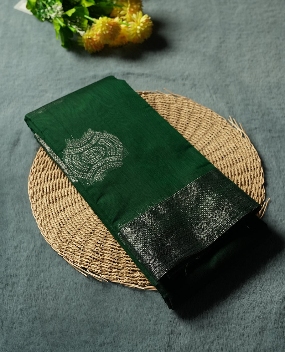 Dark Green Silk Cotton Saree with Silver Butta Body, Accented by Silver Zari Ornamental Border on Grand Pallu, Paired with Matching Blouse Piece