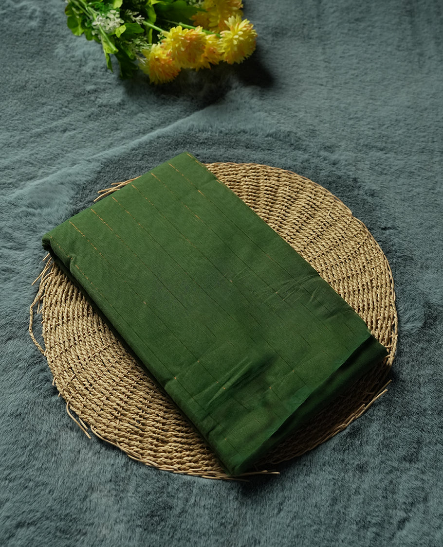 Bottle Green Colour silk cotton saree with fine gold pinstripes on the body, multitone rust-red striped pallu, and a plain rust-red blouse with a slim green edge