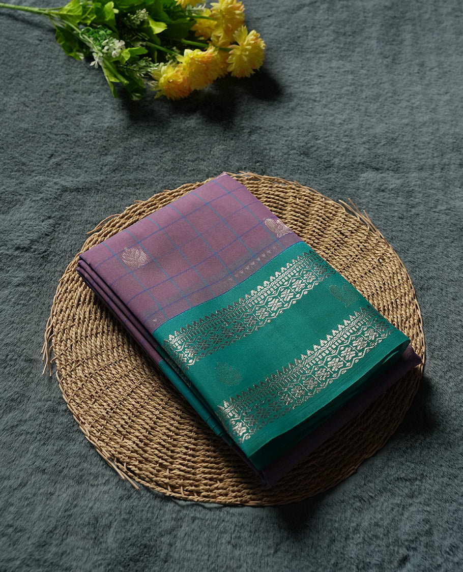 Mauve Silk Cotton Saree with Silver Butta Body, Accented by Teal and Silver Zari Geometric Border on Teal and Silver Striped Pallu, Paired with Matching Blouse Piece