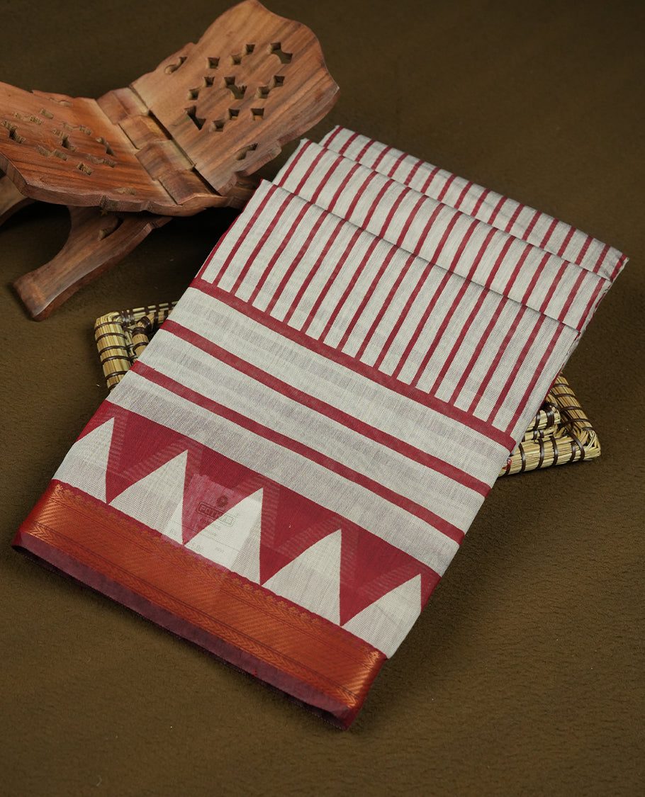 Coral red and off-white colour mixed chanderi cotton saree with striped body, coral pallu, copper zari geometric triangle border, matching coral blouse.