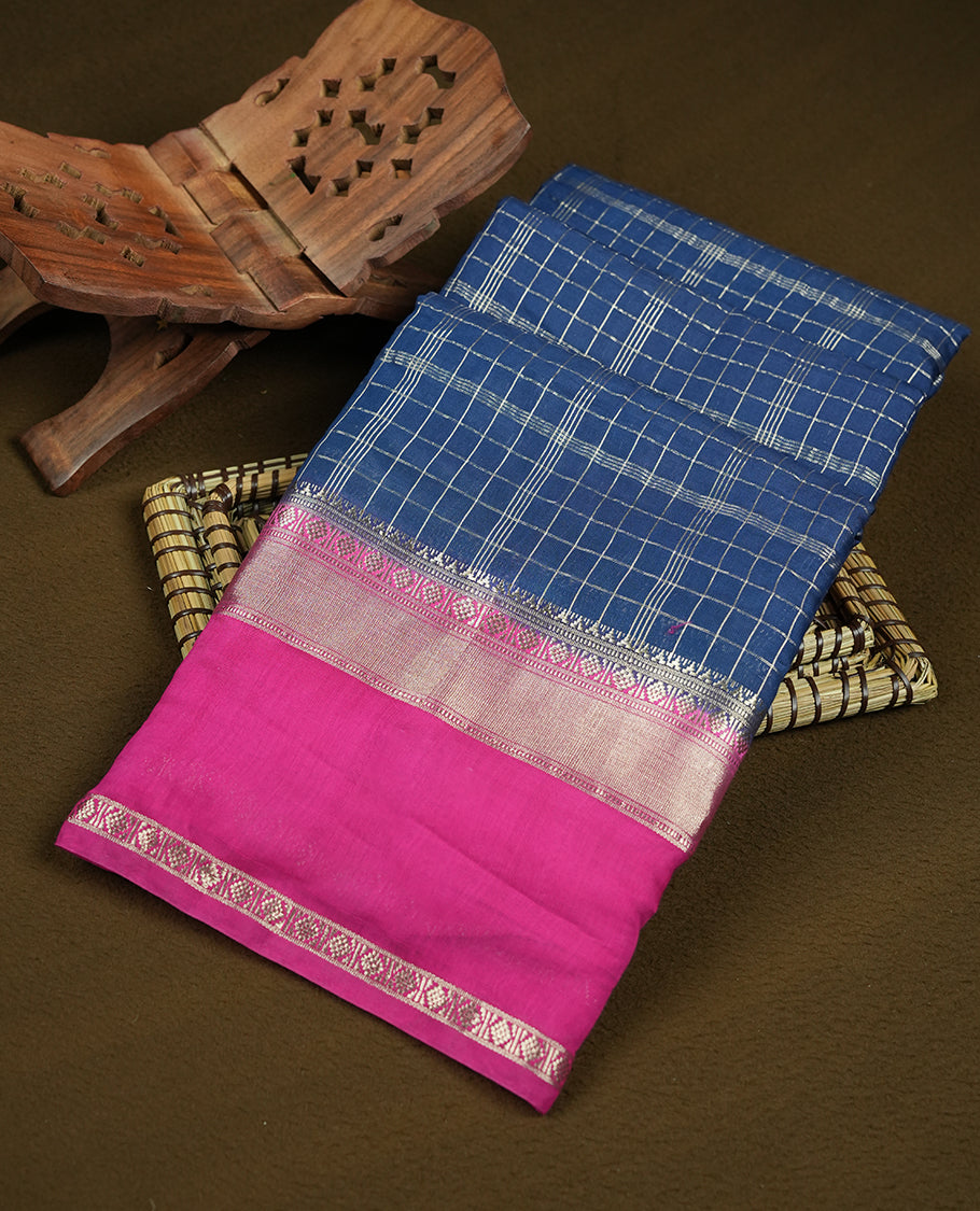 Navy blue colour mixed chanderi cotton saree with zari checkered body, rose gold zari border, magenta-pink pallu with checks, and matching magenta blouse.