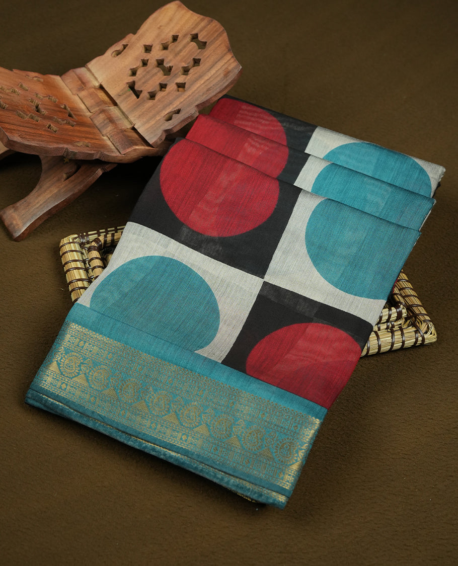 Teal and coral red colour mixed chanderi cotton saree with checkered body featuring circle motifs, geometric printed pallu, golden zari border, matching teal blouse
