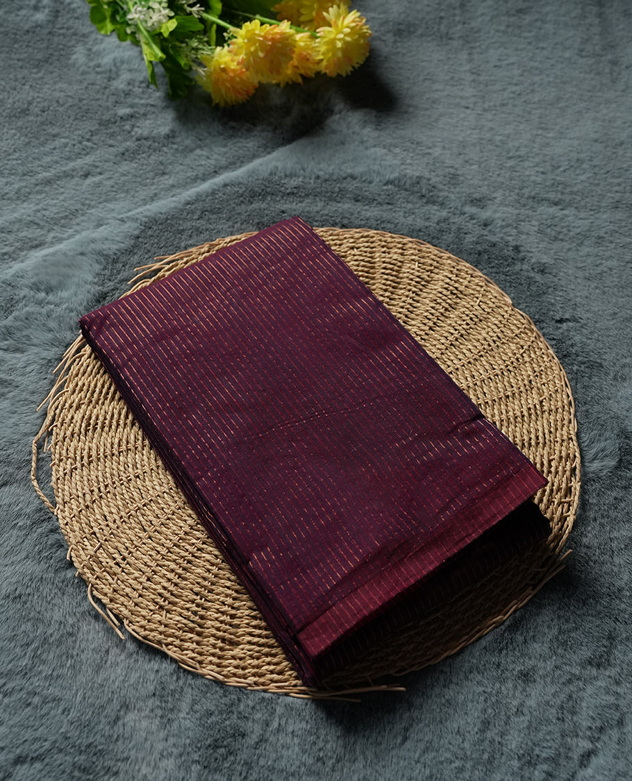 Maroon Colour Silk Cotton Saree with Gold Striped Body, Accented by Black and Brown Striped Pallu with Large Rose Gold Central Motif, Paired with Matching Blouse Piece (Copy)
