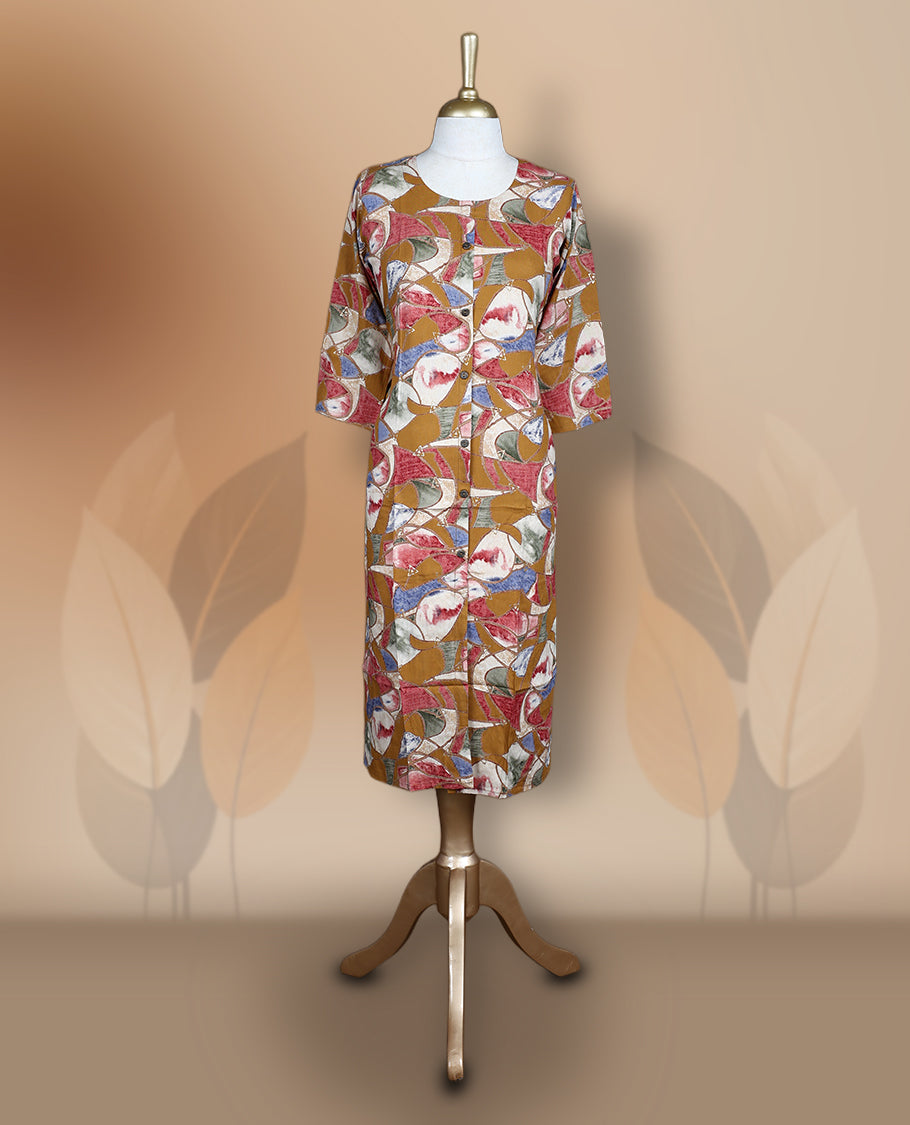 Mustard colour kurthi adorned with delicate floral prints, featuring a round neckline and three quarter sleeves & Crafted for comfort and style, perfect for casual and semi formal occasions.