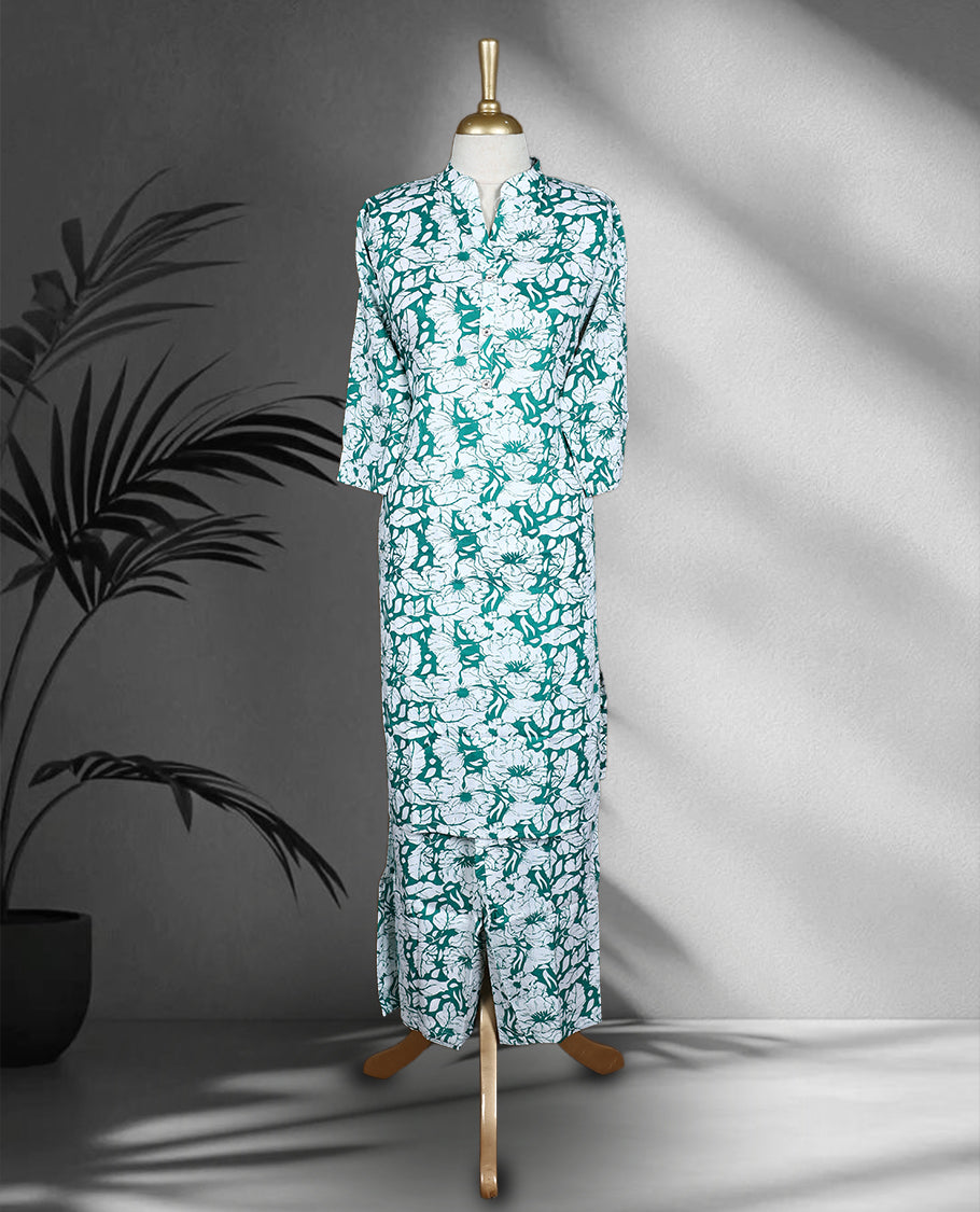 White and green colour cord set with bold floral prints, featuring a band collar top with front buttons and matching straight fit pants.