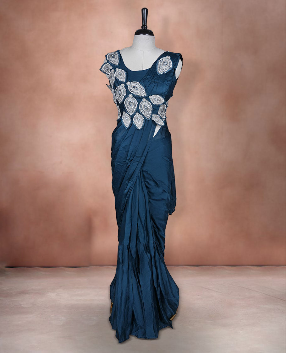 Deep Teal colour ready to wear saree featuring bold silver applique embroidery on the drape, paired with a sculpted matching blouse