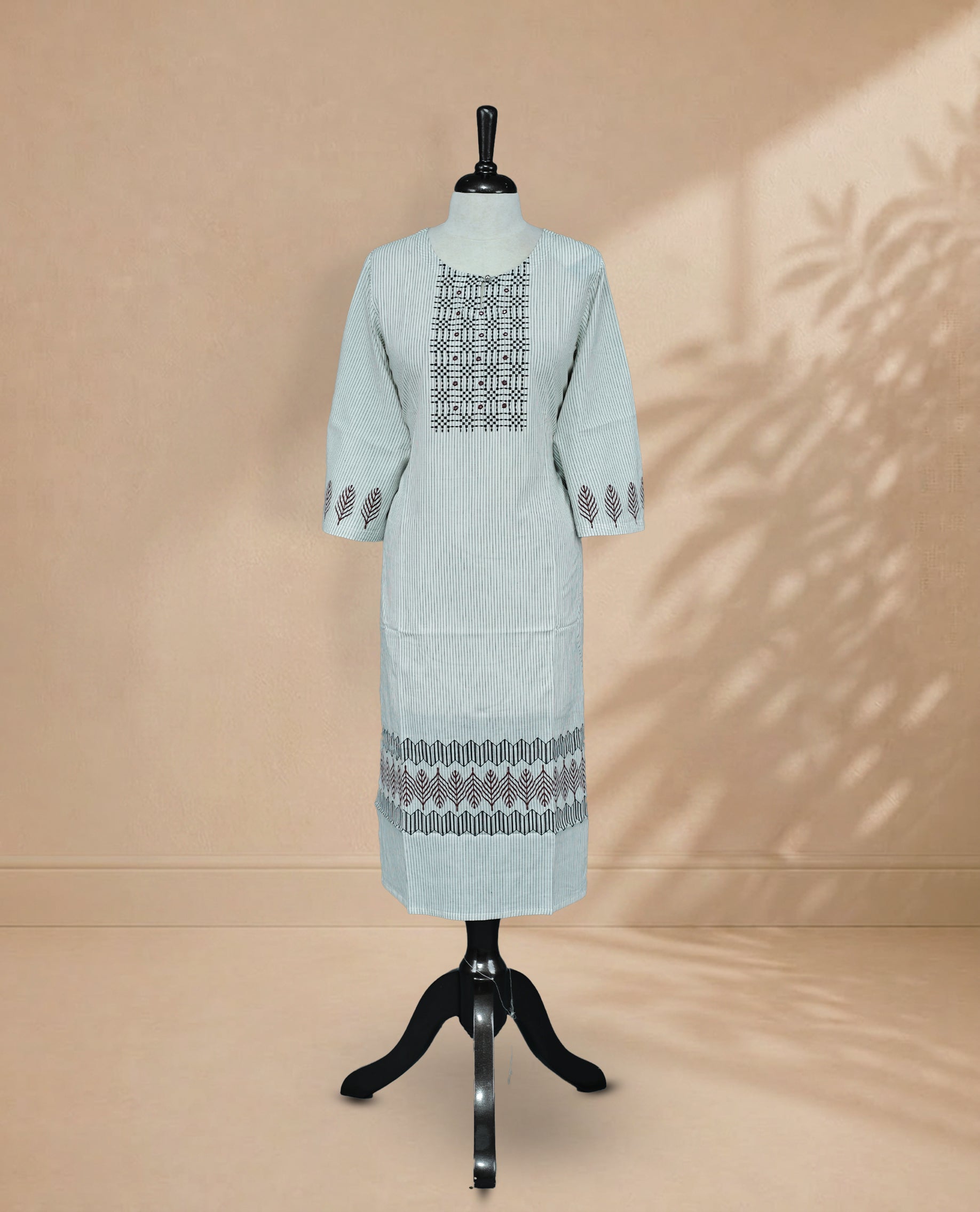 Off White Colour Kurti featuring fine vertical stripe On Body , a round neckline with intricate Box Design Print & Mirror Work , 3/4 sleeves Design