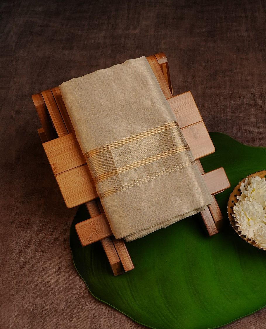 Light gold Pure Tissue Double Dhoti Featuring Classic Gold zari kara.