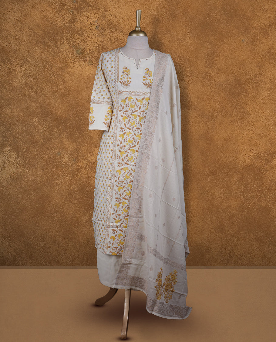 Ivory colour churidar set featuring thread embroidered on neckline, sleeves, and Yellow colour floral printed pattern on body , Paired with a matching dupatta