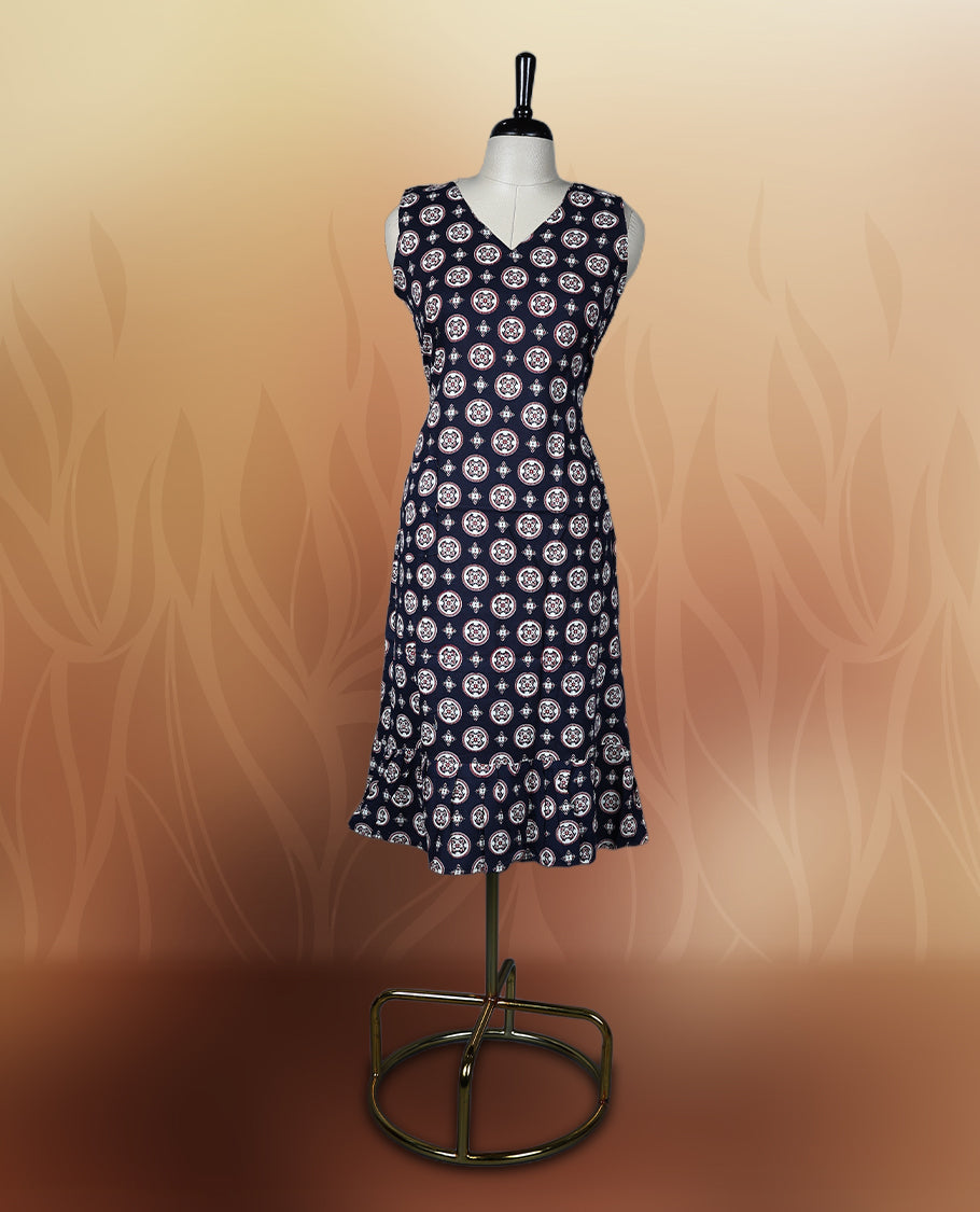 Black colour sleeveless nightwear with stylish white circular prints and a flattering V neckline, Tailored for comfort with a flared hem, perfect for casual outings, daily wear, or relaxed summer days.