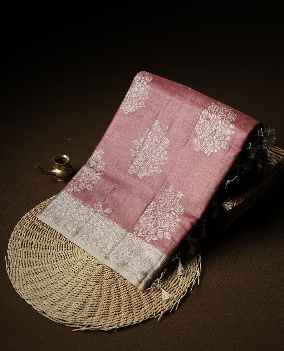 Light brown colour pure banaras tusser silk saree highlighting antique zari pattern across body, with contrast cream colour with zari border and paired with matching blouse