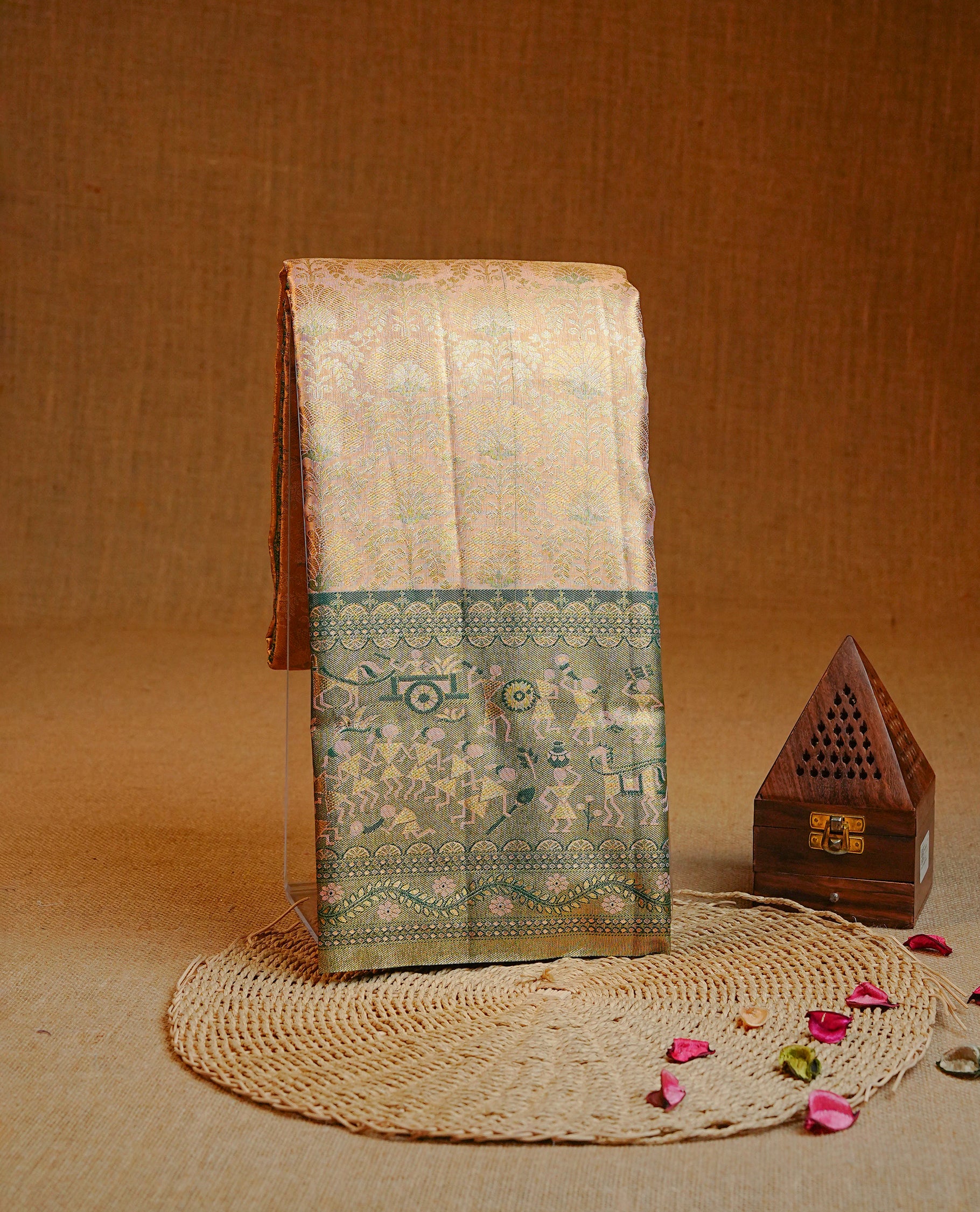Gold & Peach colour Double shade Semi tissue silk saree featuring Gold Zari pattern on body, Contrast green colour with gold zari Tribal pattern border, paired with matching.
