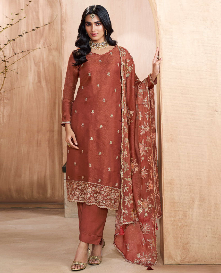 Brown colour silk suit material with heavy kurta embroidery and stone work, paired with premium soft santoon bottoms and a silk dupatta detailed with rich floral kodi work