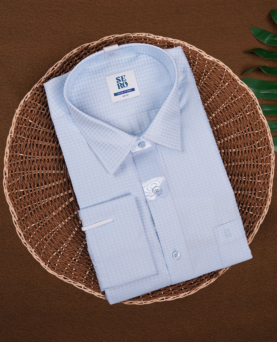 Soft blue colour full sleeve shirt featuring an all over abstract geometric print for a modern, stylish appeal, Designed with a classic collar and button down front, perfect for smart casual outings.