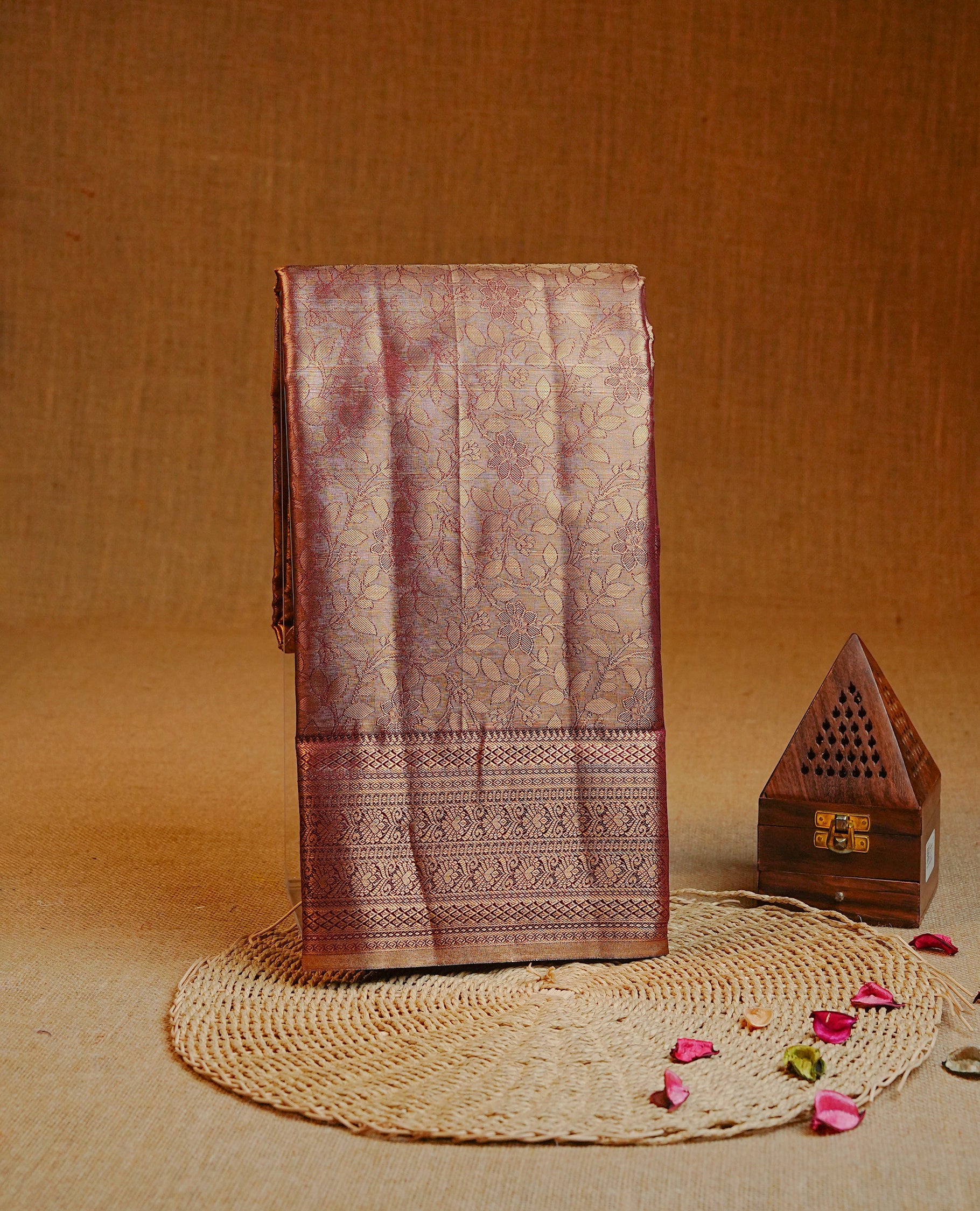 Gold & brown colour Double shade Semi tissue silk saree featuring Gold Floral kodi pattern on body, self colour with traditional border, paired with matching.