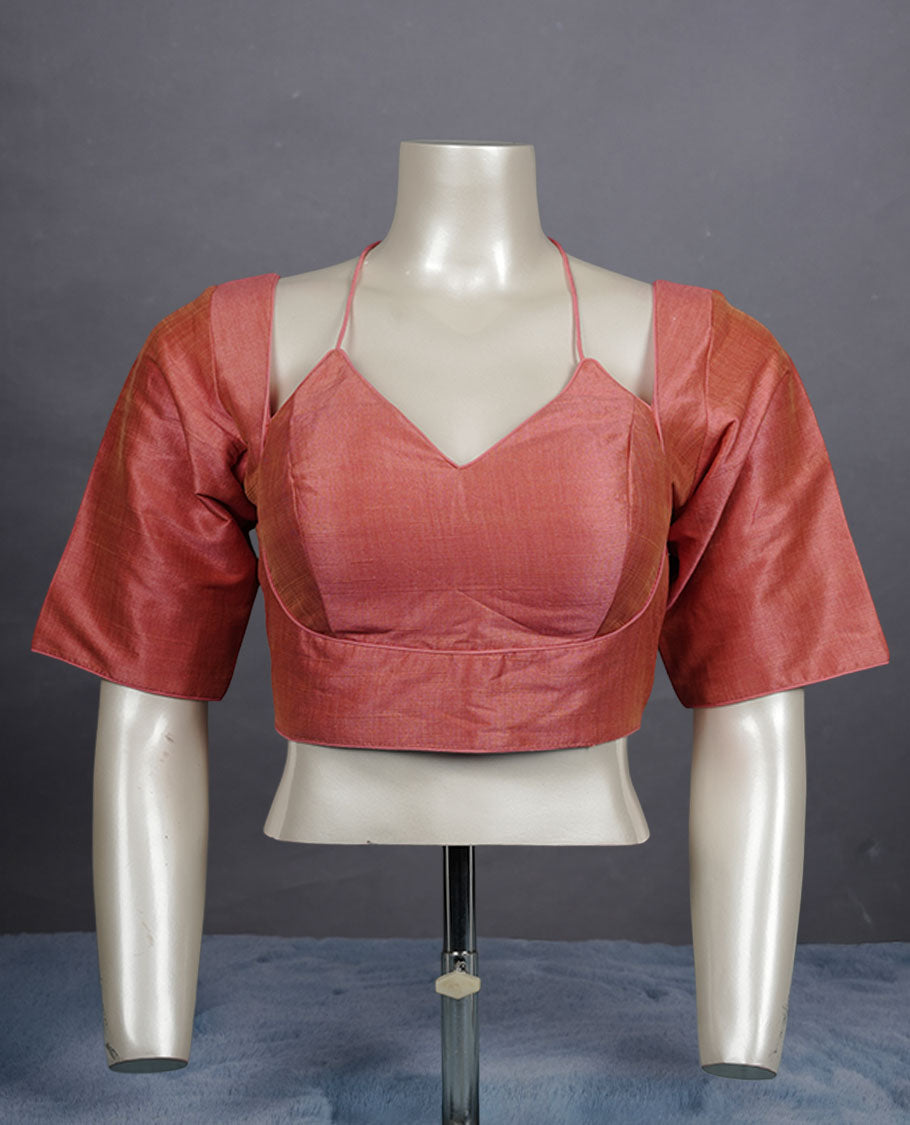Peach colour colour silk padded readymade blouse with elbow-length sleeves, a V-neck front, and a deep U-back with tie-up dori.