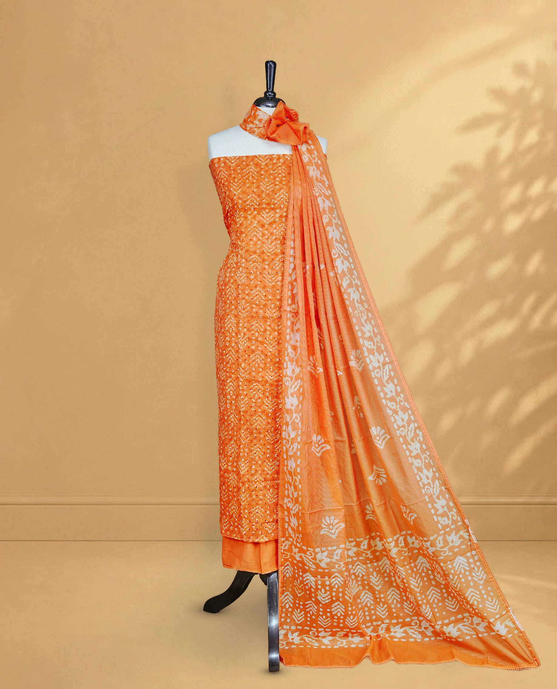 Orange Colour Salwar Material Featuring Hakoba Pattern on body, paired with matching bottom & Elegant Dupatta For All go occasion Wear.
