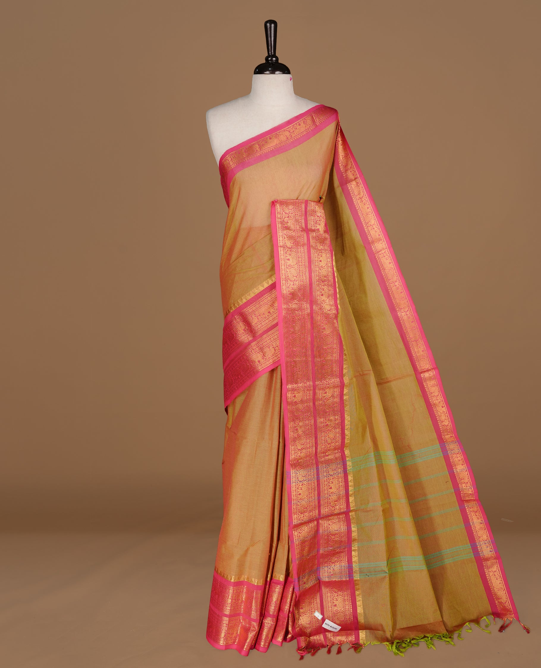 Olive colour Chettinad cotton saree featuring Elegant plain body, complemented by contrast Maroon colour with gold zari border, paired with matching blouse piece.