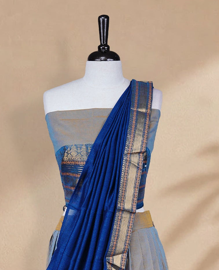 Golden & Blue double shade colour Half saree featuring Plain skirt with Zari border on contrast Teal colour border, Unstitched Blouse and matching dupatta.