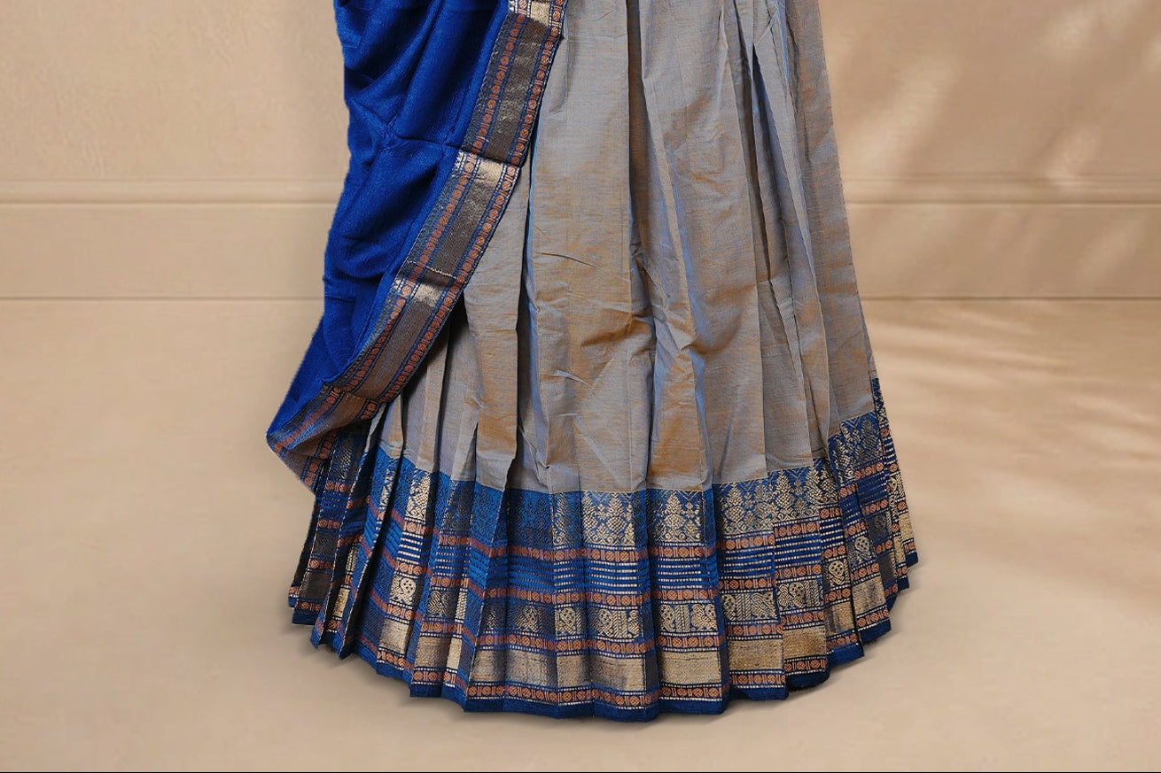 Golden & Blue double shade colour Half saree featuring Plain skirt with Zari border on contrast Teal colour border, Unstitched Blouse and matching dupatta.