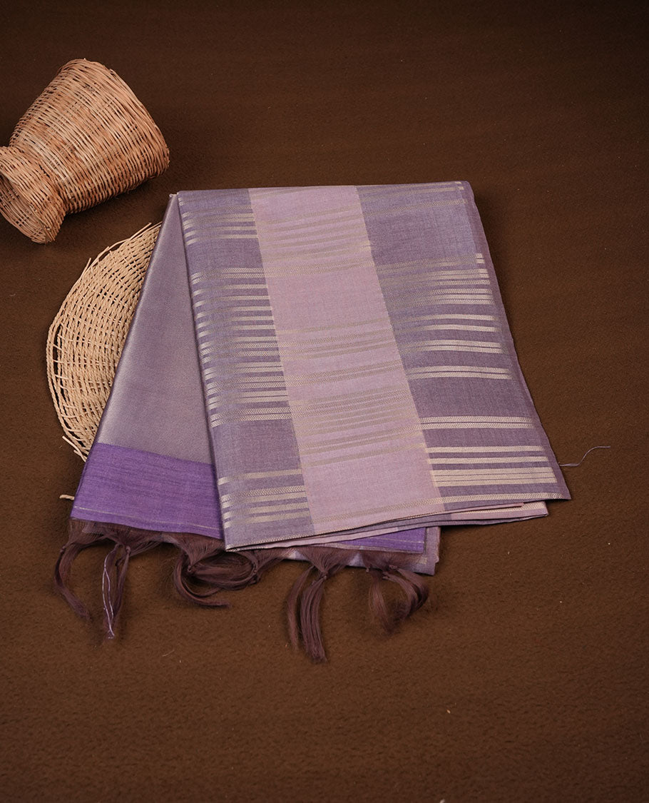 Lavender and pink colour semi tussar silk saree, featuring an intricate gold zari stripes on the body and pallu comes with matching blouse.