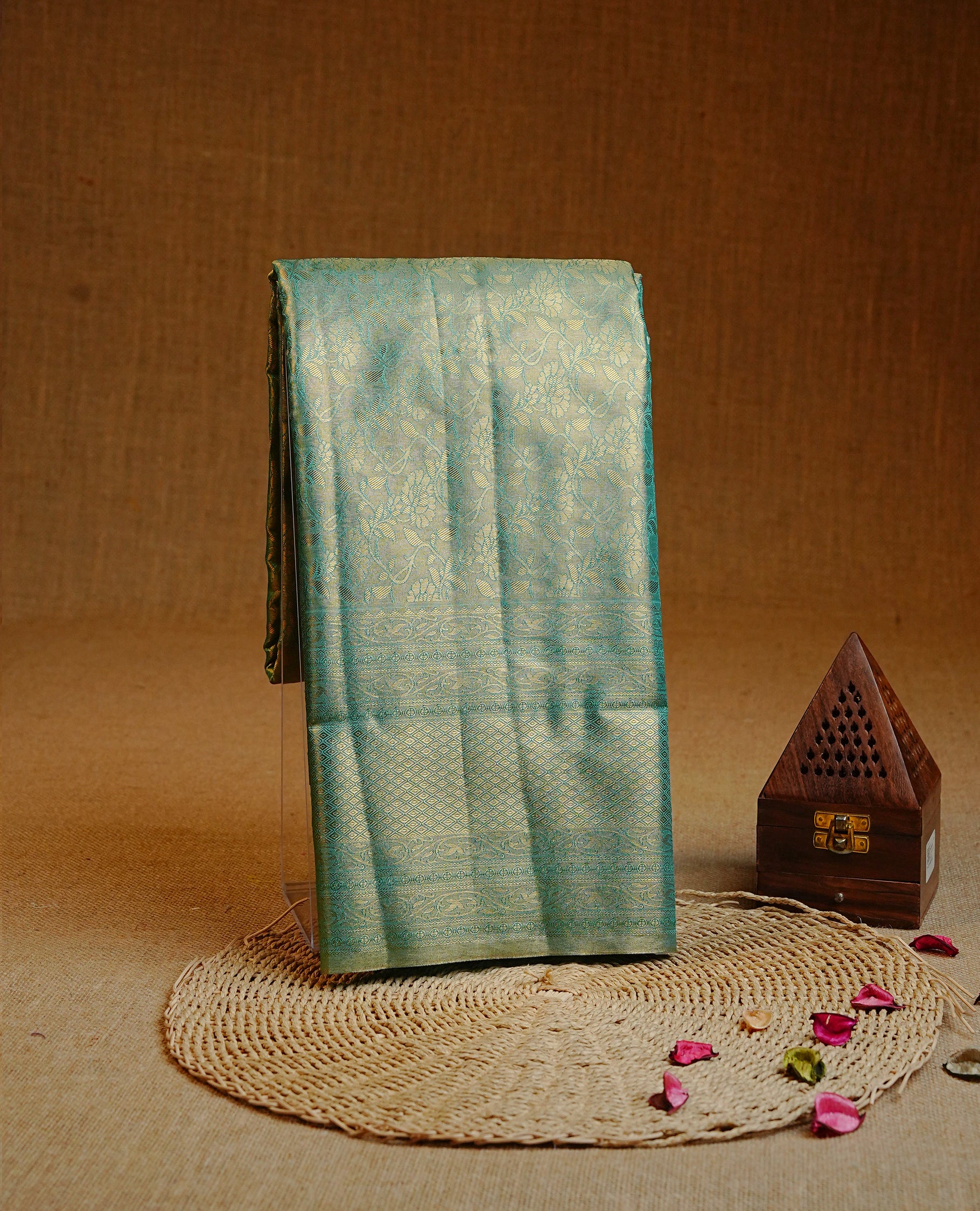 Green & Gold colour Double shade Semi tissue silk saree featuring self color kodi pattern on body, self colour with traditional border, paired with matching.